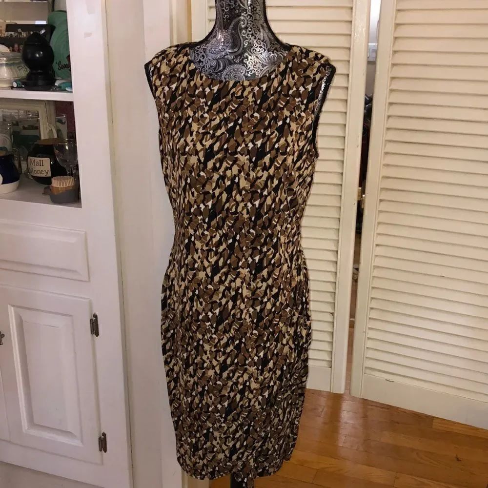 Animal Print Faux Wrap Stretch Dress. Poly Spandex. Wrinkle free. Gorgeous!